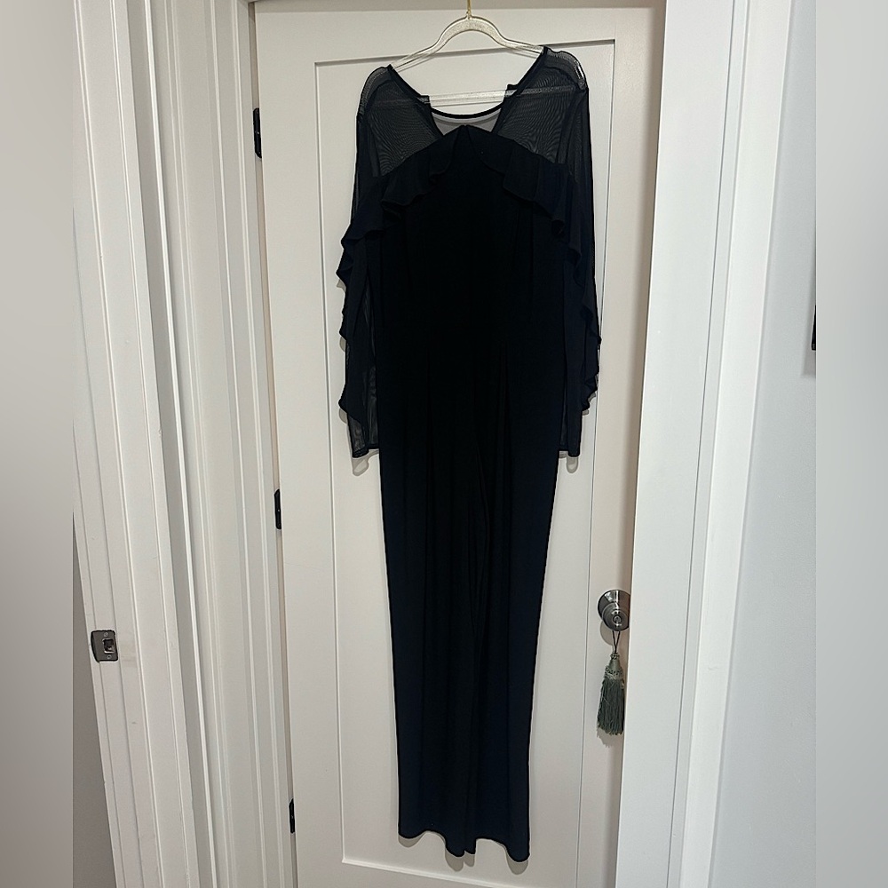 Black sheer arm jumper.